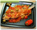 Fried Fish in Fresh Tomatoes and Green Olives